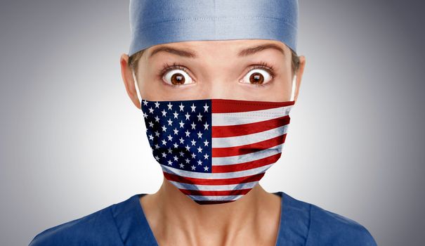 Asian American doctor shocked for COVID-19 crisis help with USA flag on surgical mask. Healthcare workers needing PPE help to fight COVID-19 Coronavirus .