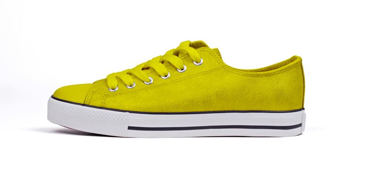 Single shoe isolated on white background - Yellow
