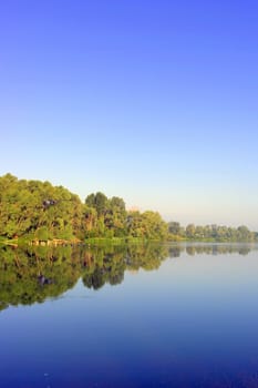 Beautiful summer landscape with river and forest