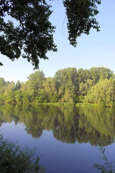 Beautiful summer landscape with river and forest