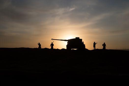 War Concept. Military silhouettes fighting scene on war fog sky background, World War Soldiers Silhouette Below Cloudy Skyline sunset. Selective focus