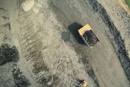 A big quarry for gold mining. The technique is in the car.