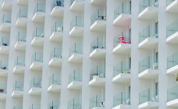 Summer holiday tourism hotel facade with balcony front