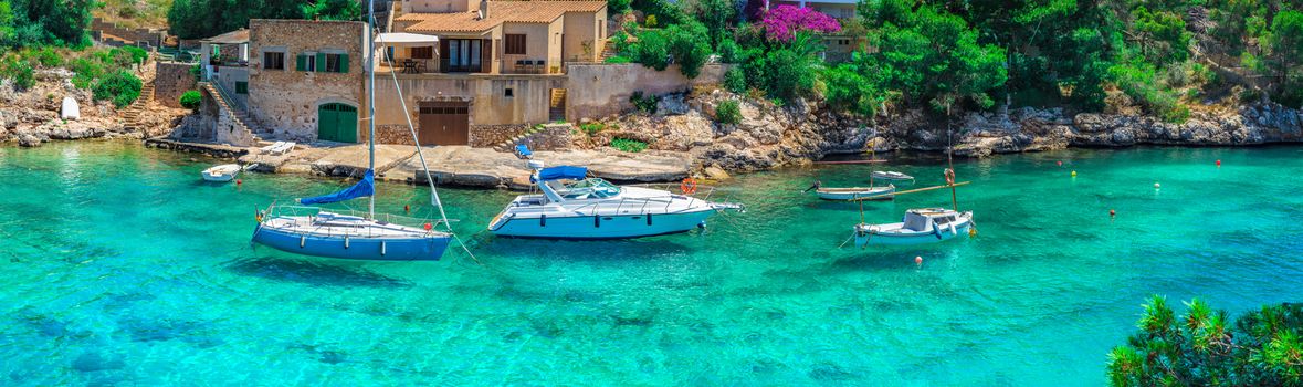 Panoramic view of luxury boats at coast of Cala Figuera on Mallorca, Mediterranean Sea