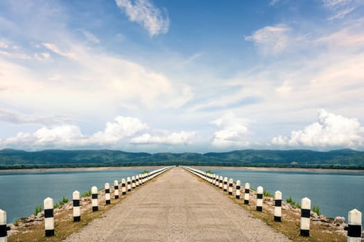 The route is in the middle of the reservoir and surrounded by mountains