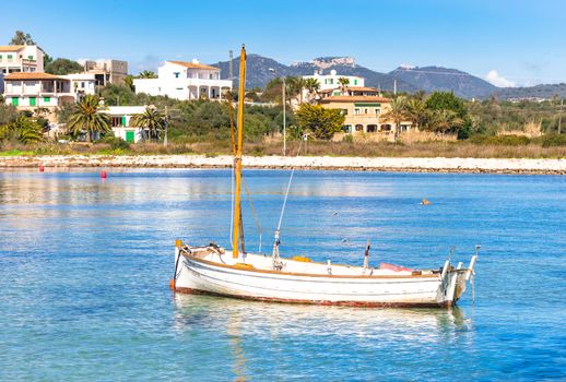 Romantic view of old fishing boat at coast of Portopetro on Mallorca island, Spain Mediterranean Sea