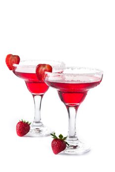 Strawberry cocktail drink in glass on blue wooden table