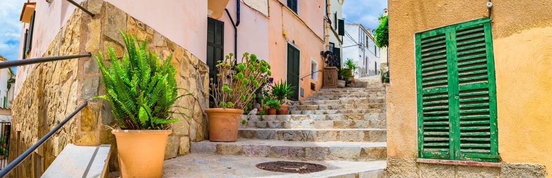 Beautiful alley staircase at the old mediterranean town of Andratx on Mallorca, Spain