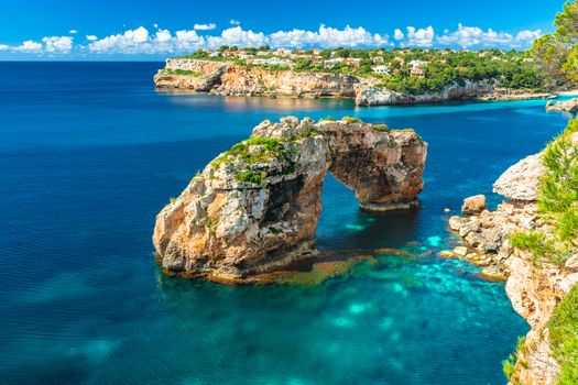 view of the natural landmark, Es Pontas, natural rock arch on Mallorca island, Spain