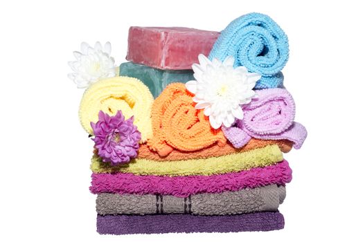 soap bars on facecloths off various shades with some in rolls and flowers