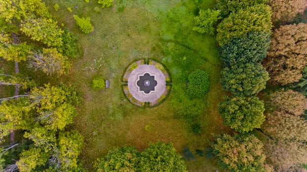 Top view of the lawn in the middle of the forest. Aerial view.