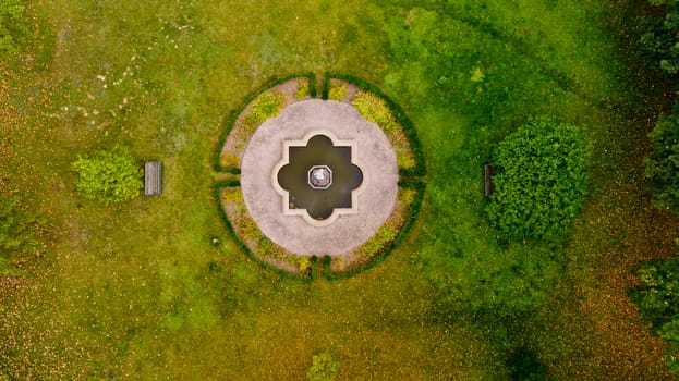 Top view of the lawn in the middle of the forest. Aerial view.