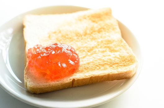 A Strawberry Jam Bread on plate ready to serve and enjoy eating in breakfast.