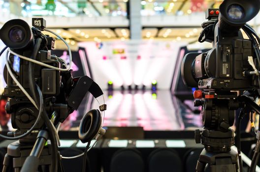 Video Camera has focus to the showing on  the stage for broadcasting and recording.