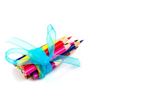 Multicolored pencils isolated on white background. School supplies.