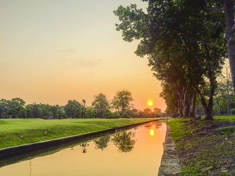 Sunrise on the river in Phutthamonthon Nakhon Pathom Province of Thailand, west of Bangkok.