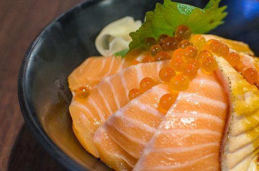 Salmon Sashimi Rice and Salmon Eggs ready to serve in japanese restaurant.