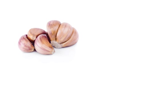 Garlic isolated on white background with reflection.