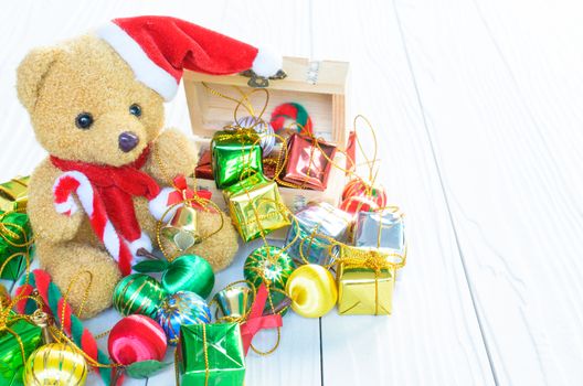 A Bear has a lot of giftbox from christmas and new year festival all around.