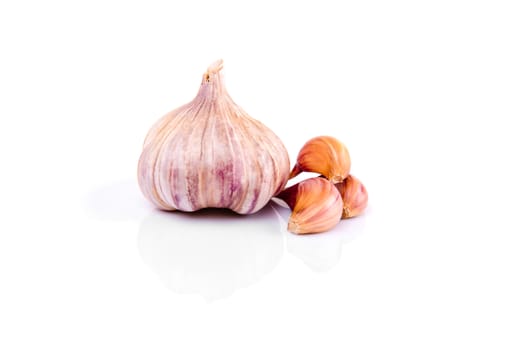 Garlic isolated on white background with reflection.