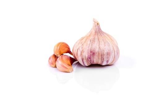 Garlic isolated on white background with reflection.