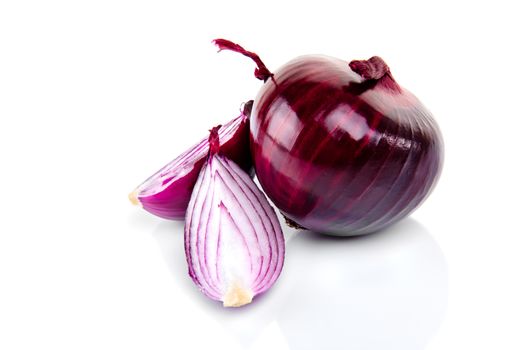 Red onion and half slice on white isolated background with reflect.