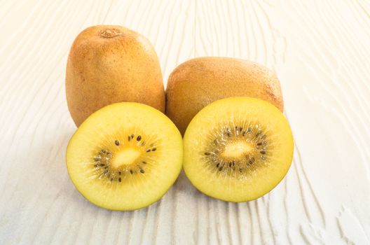 kiwi on white wood background in the morning.