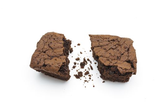 A Chocolate Brownie has slice isolated on whtie background.