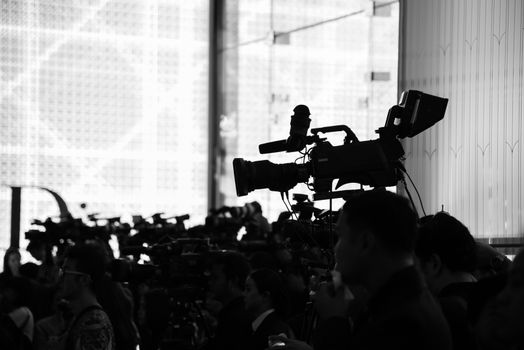 Video Camera has focus to the showing on  the stage for broadcasting and recording with monochrome color.