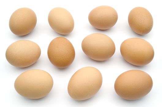 A lot of brown chicken egg isolated on white background.