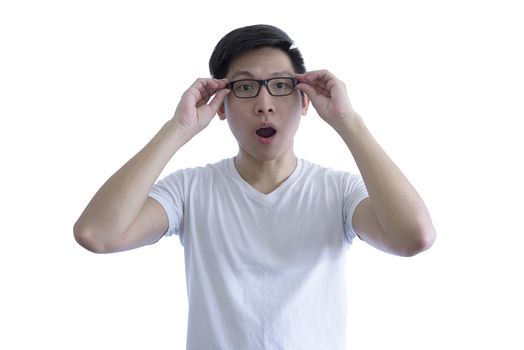 Asian handsome man with white shirt and orange eyeglasses has feeling like a surprise and shock isolated on white background.