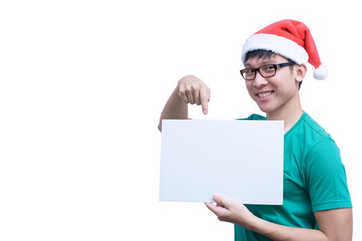 Asian Santa Claus man with eyeglasses and green shirt has holding a white blank advertisement banner isolated on white background with copy space.