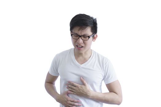 Asian handsome man with white shirt and orange eyeglasses has painful with stomachache isolated on white background.