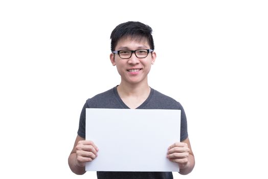 Asian man with eyeglasses and grey shirt has holding a white blank advertisement banner isolated on white background with copy space.