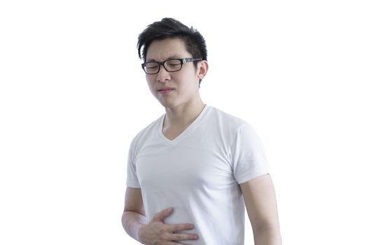 Asian handsome man with white shirt and orange eyeglasses has painful with stomachache isolated on white background.