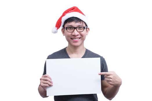 Asian Santa Claus man with eyeglasses and grey shirt has holding a white blank advertisement banner isolated on white background with copy space.