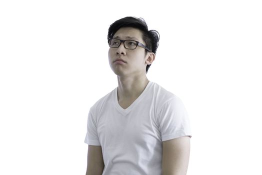 Asian handsome man with white shirt and orange eyeglasses has disappointed for luck isolated on white background and clipping paths.