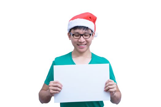 Asian Santa Claus man with eyeglasses and green shirt has holding a white blank advertisement banner isolated on white background with copy space.