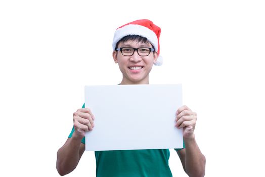 Asian Santa Claus man with eyeglasses and green shirt has holding a white blank advertisement banner isolated on white background with copy space.