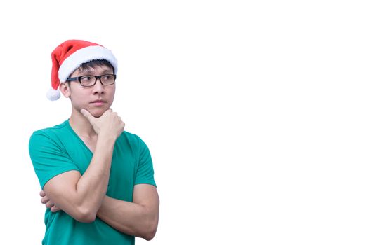 Asian Santa Claus man with eyeglasses and green shirt has seriuosly thinking for new idea and success isolated on white background with copy space.