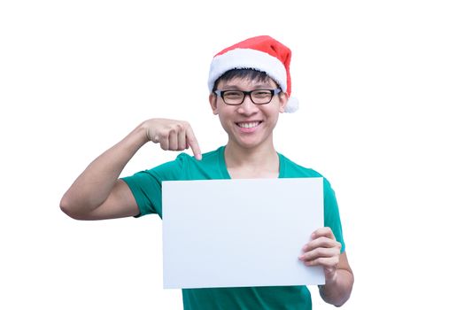 Asian Santa Claus man with eyeglasses and green shirt has holding a white blank advertisement banner isolated on white background with copy space.