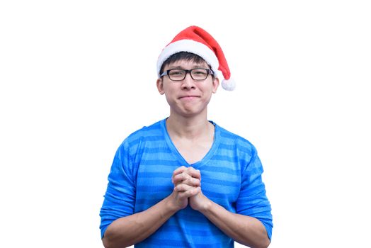 Asian Santa Claus man with eyeglasses and blue shirt has plead and appeal for luck isolated on white background with copy space.