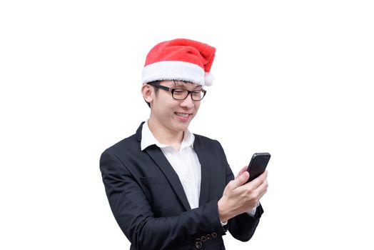 Business man has mobile playing with Christmas festival themes isolated on white background.