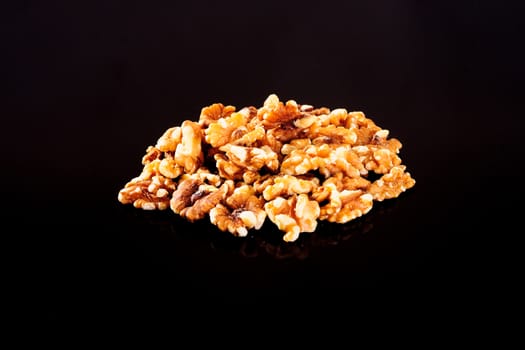 California Walnuts on a black background