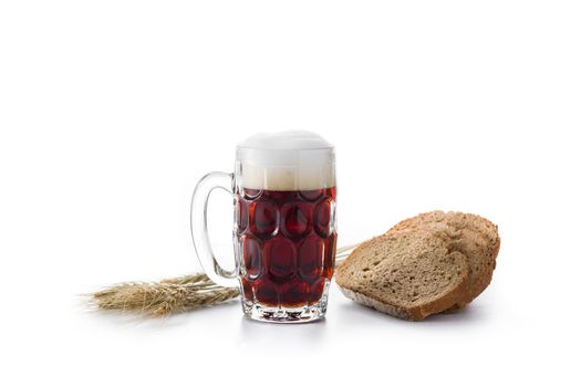 Traditional kvass beer mug with rye bread isolated on white background