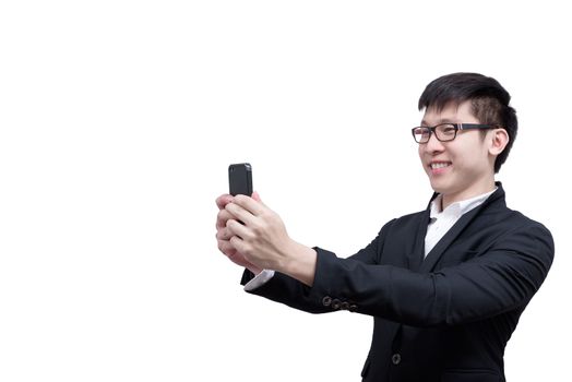 Asia businessman has holding a phone for working with smile and happy isolated on white background.