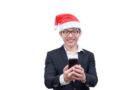 Business man has mobile playing with Christmas festival themes isolated on white background.
