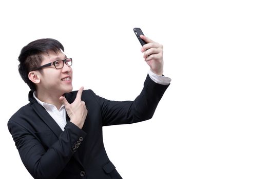 Asia businessman has holding a phone for selfie with smile and happy isolated on white background.