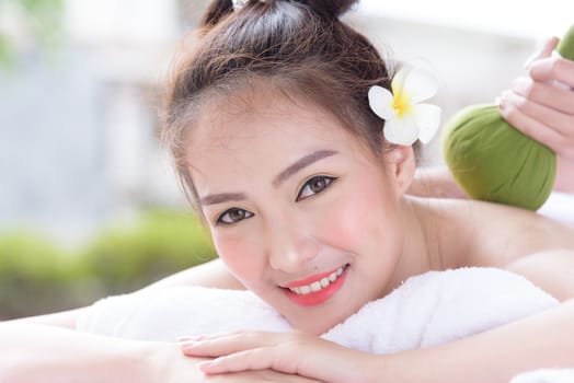 Portrait of beautiful asian people with close up view and close up eyes and having hand massage in spa salon. Beauty, healthy, spa and relaxation concept.