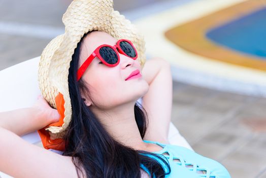 Sexy asian woman has sleeping in the evening and sunset time with relaxing on vacation and holiday.